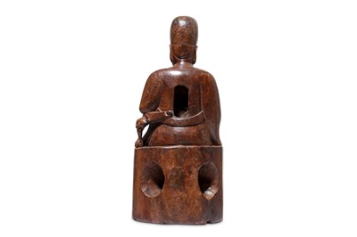 Lot 116 - A CHINESE CYPRESS WOOD FIGURE OF A SEATED...