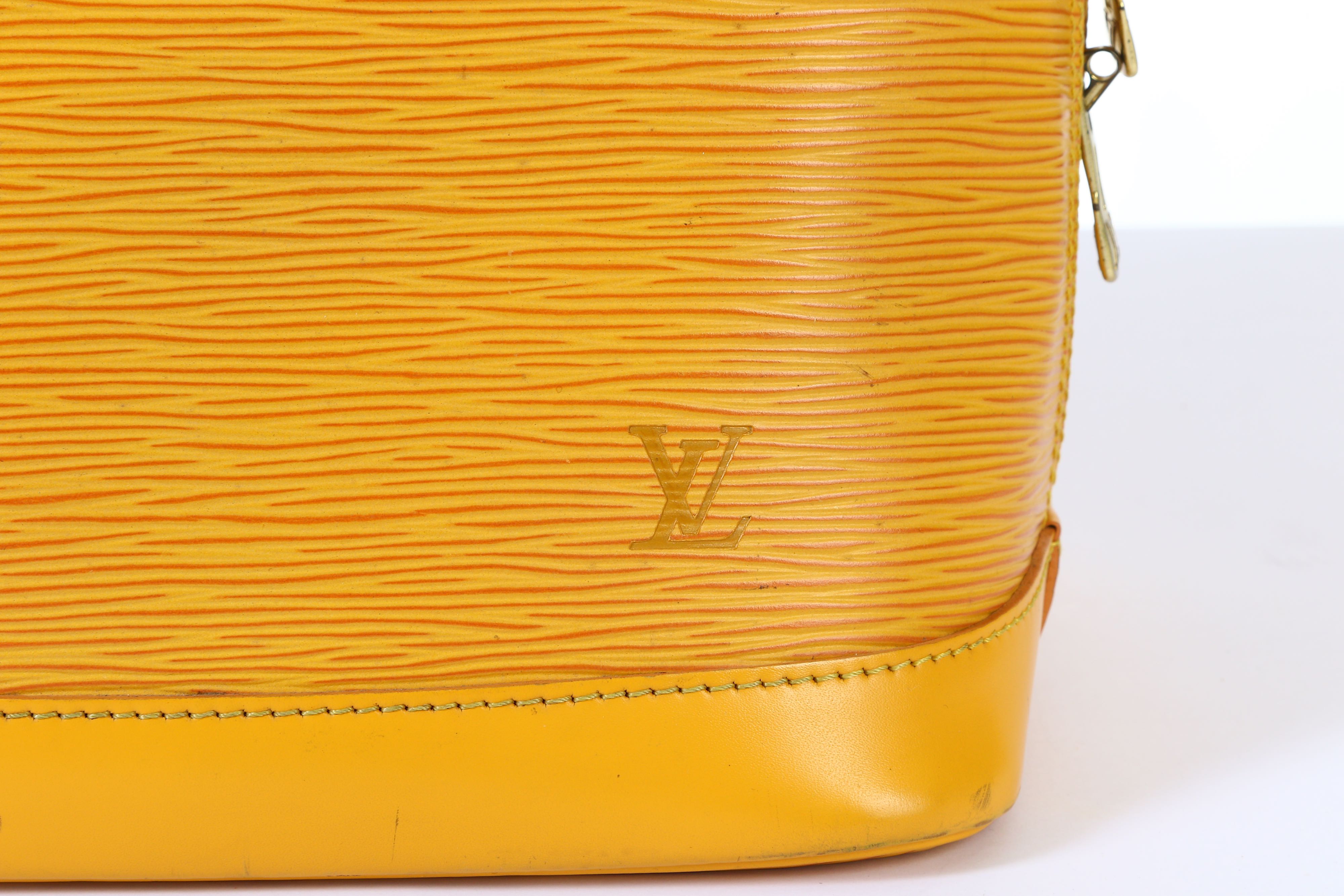 Lot 145 - Louis Vuitton Yellow Epi Alma PM, c. 1996
