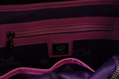 Lot 154 - MCM Purple Sprinkle Stark Stud Small Backpack,...
