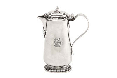 Lot 315 - A very rare George II silver hot milk jug or...