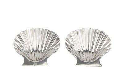 Lot 314 - A pair of George II sterling silver butter or...