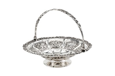Lot 280 - A George IV sterling silver swing handled cake...
