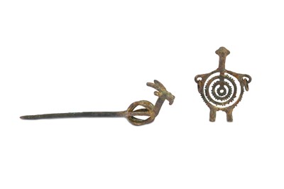 Lot 86 - TWO LURISTAN BRONZES Including a pin, with an...