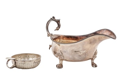 Lot 665 - A Victorian sterling silver sauce boat,...