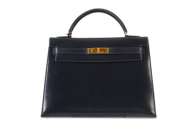 Lot 175 - Hermès Navy Box Kelly Sellier 32, c. 1990,...