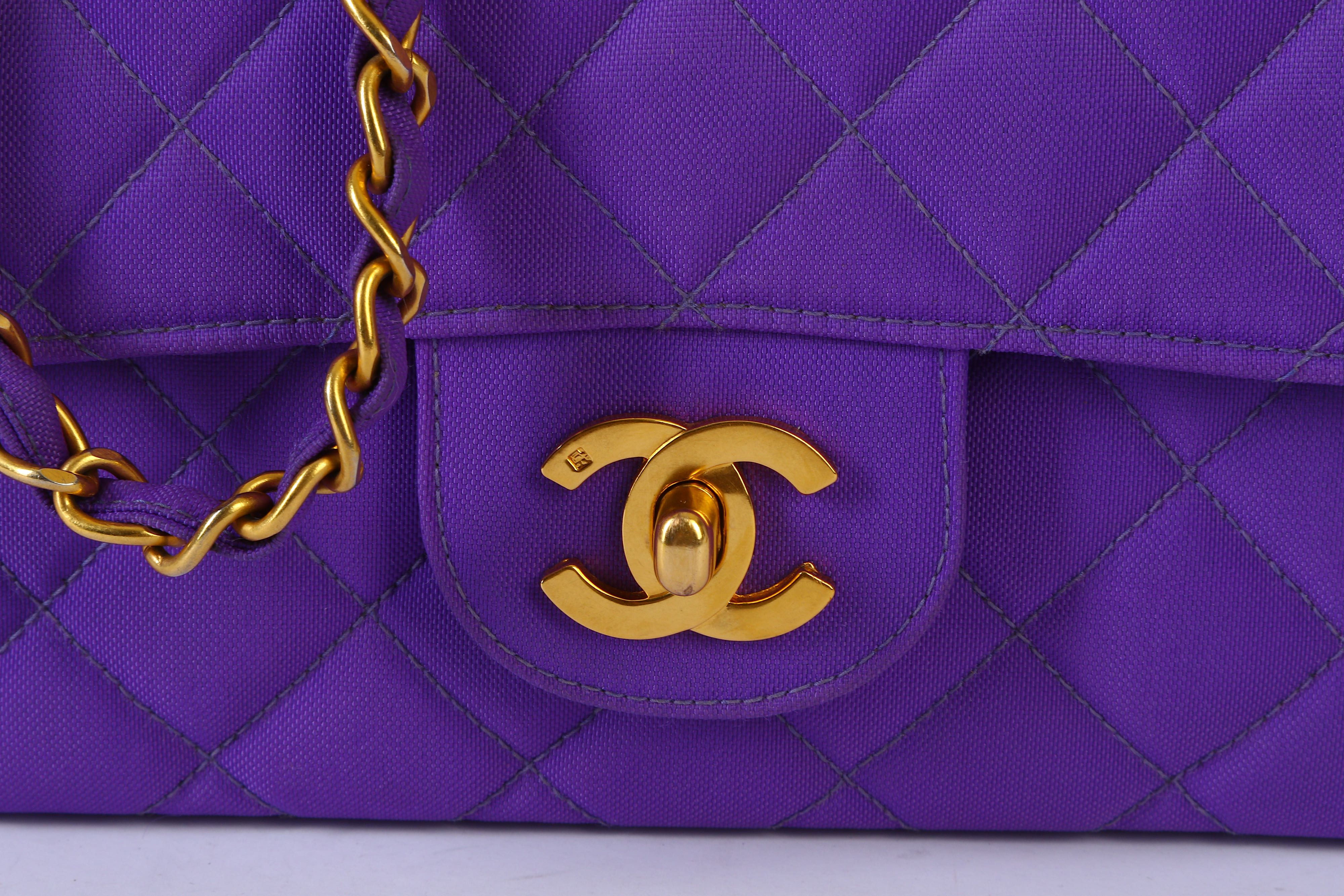 Sold at Auction: CHANEL CLASSIC SINGLE FLAP 25 IN PURPLE QUILTED CANVAS