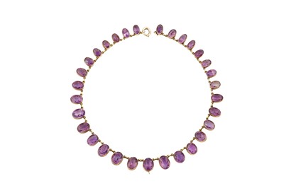 Lot 30 - An amethyst rivière   The graduated strand of...