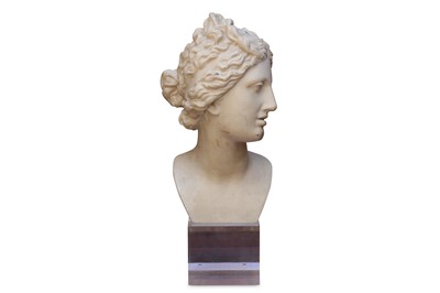 Lot 330 - A marble effect bust of a woman's head, on...