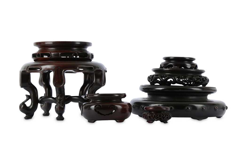 Lot 226 - SEVEN CHINESE HONGMU STANDS. Qing Dynasty,...