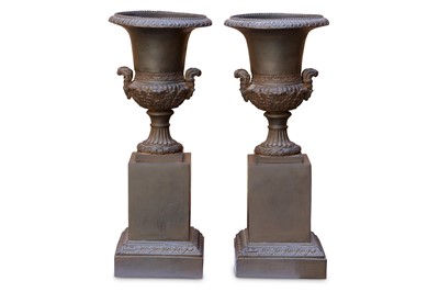 Lot 354 - A small pair of antique style resin campana...