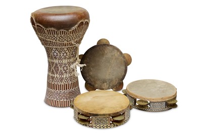 Lot 382 - A cased Middle Eastern Doumbek type drum with...