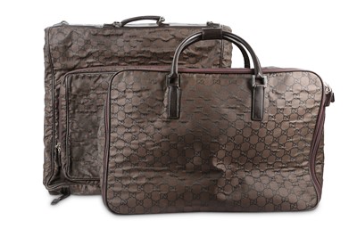 Lot 423 - Two Gucci Supreme Luggage Bags, brown GG...