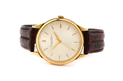 Lot 648 - INTERNATIONAL WATCH & CO. AN 18K YELLOW GOLD...