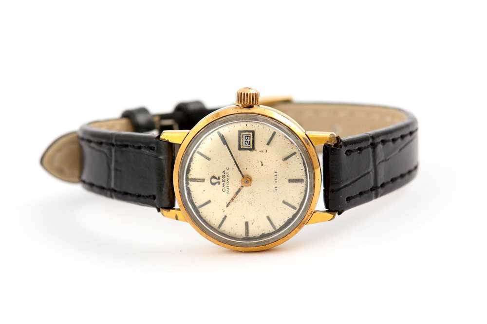 Lot 620 - OMEGA. A LADIES AUTOMATIC GOLD PLATED...