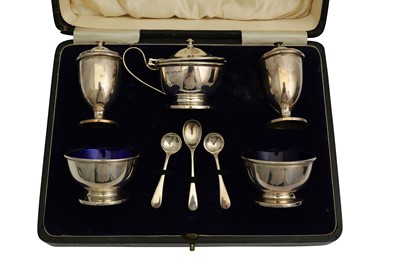 Lot 717 - A cased George V sterling silver five piece...