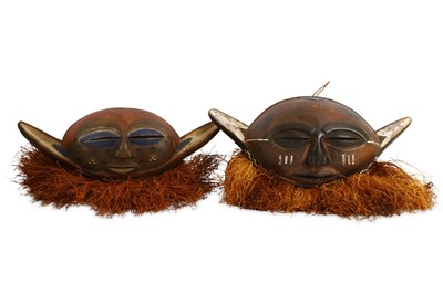 Lot 811 - TWO EASTERN PENDE STYLE MASKS  Both with...