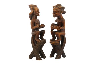 Lot 815 - TWO CHOKWE SEATED FIGURES Including a female...