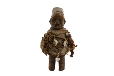 Lot 816 - A YAKA WOOD FETISH FIGURE The squat figure,...