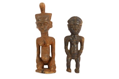 Lot 822 - TWO TRIBAL WOOD FIGURES Including a standing...