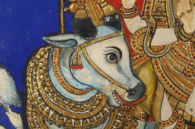 Lot 341 - A TANJORE PAINTING OF SHIVA AND PARVATI ON...