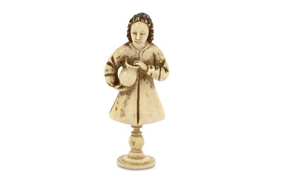 Lot 866 - AN IVORY FIGURINE OF A MAN WITH AN EWER ...