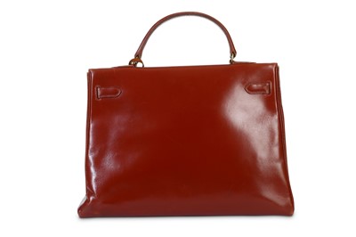 Lot 29 - Hermès Oxblood Box Kelly Retourné 35, 1960s,...