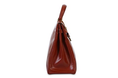 Lot 29 - Hermès Oxblood Box Kelly Retourné 35, 1960s,...
