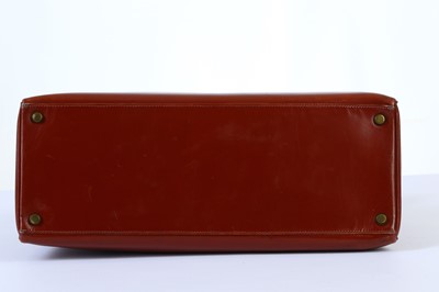 Lot 29 - Hermès Oxblood Box Kelly Retourné 35, 1960s,...