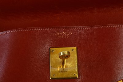 Lot 29 - Hermès Oxblood Box Kelly Retourné 35, 1960s,...