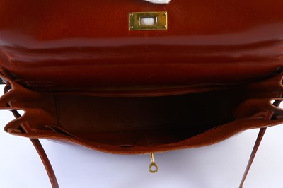 Lot 29 - Hermès Oxblood Box Kelly Retourné 35, 1960s,...
