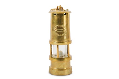 Lot 1039 - An early 20th Century brass miner's safety...