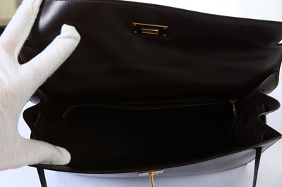Lot 110 - Hermès Dark Brown Kelly Sellier 32, c. 2002,...