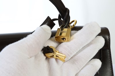Lot 110 - Hermès Dark Brown Kelly Sellier 32, c. 2002,...