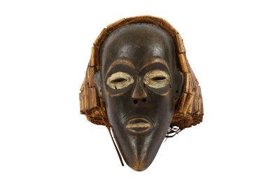 Lot 826 - A FRINGED WOOD MASK Depicted with an elongated...