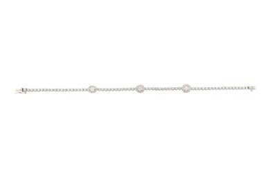 Lot 25 - A diamond bracelet Designed as a line of...