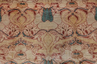 Lot 16 - A FINE VOYSEY DESIGN CARPET approx: 9ft.6in. x...