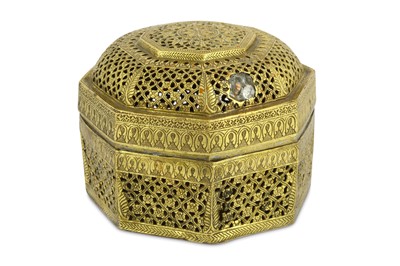 Lot 318 - AN OCTAGONAL GILT-BRASS LIDDED SPICE BOX...