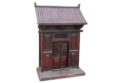 Lot 482 - A decorative Asian shrine, the table top...