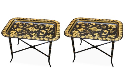 Lot 706 - A pair of ebonised and parcel gilt tray top...