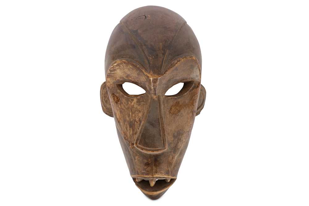 Lot 807 - AN AFRICAN WOOD MASK With a bulbous forehead...