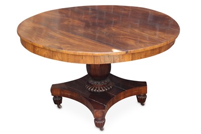 Lot 301 - A Regency rosewood circular tilt-top breakfast...