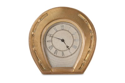 Lot 674 - A 20th century brass strut clock in the form...