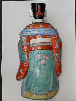 Lot 63 - A CHINESE FAMILLE ROSE FIGURE OF AN IMMORTAL.