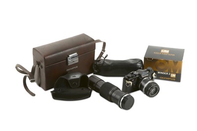 Lot 989 - An Olympus OM-2n SLR Camera Outfit Serial No:...