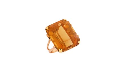 Lot 258 - A citrine dress ring The emerald-cut citrine...