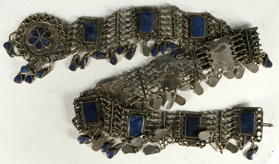 Lot 79 - An Afghan white metal belt decorated with...