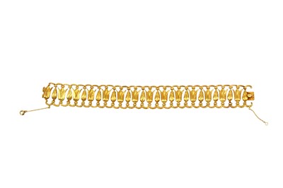 Lot 223 - An Egyptian Revival fancy-link bracelet, circa...