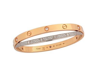 Lot 150 - A diamond-set double 'Love' bangle, by Cartier...