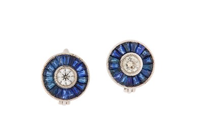 Lot 62 - A pair of sapphire and diamond earrings Each...