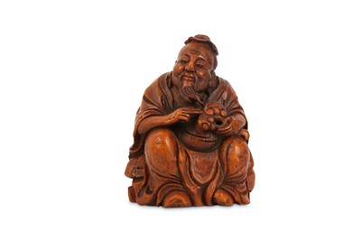 Lot 557 - A CHINESE BAMBOO CARVING OF A SAGE.
